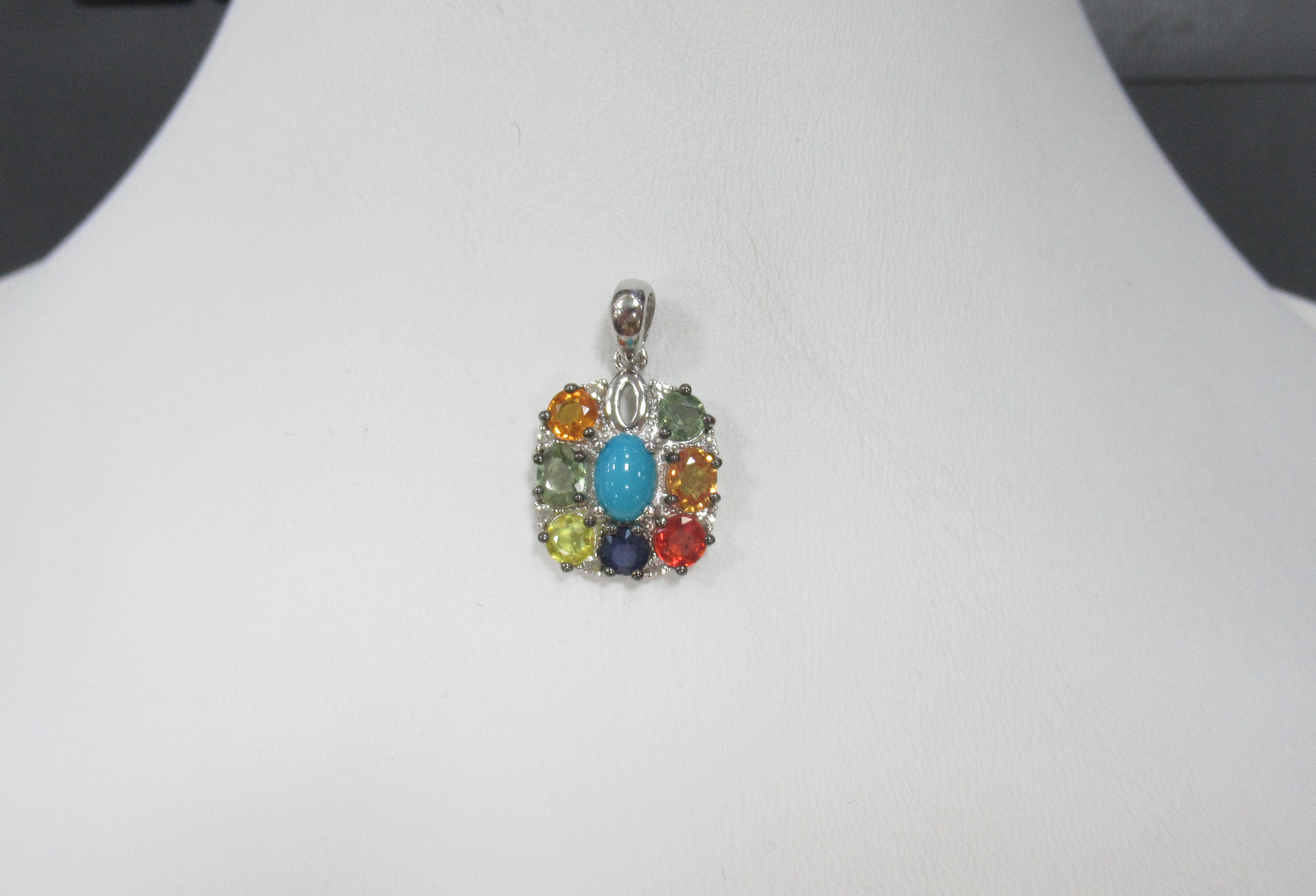 Серебряная подвеска с бирюзой и мультисапфирами